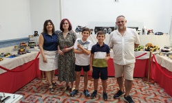 Participantes en la exposición junto a Marta Muñoz en el museo PlomHist