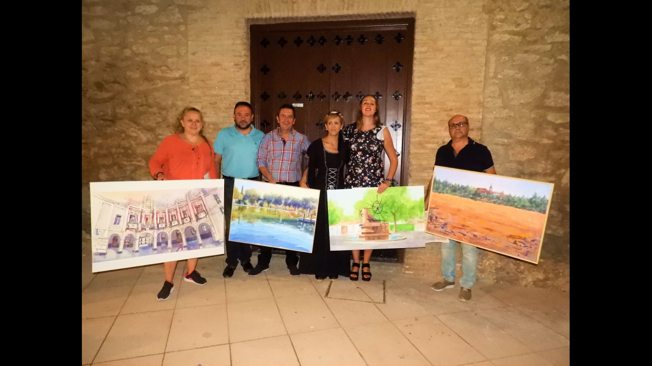 Silvia Cebrián y Juan López de Pablo, junto a los ganadores en el Certamen de Pintura