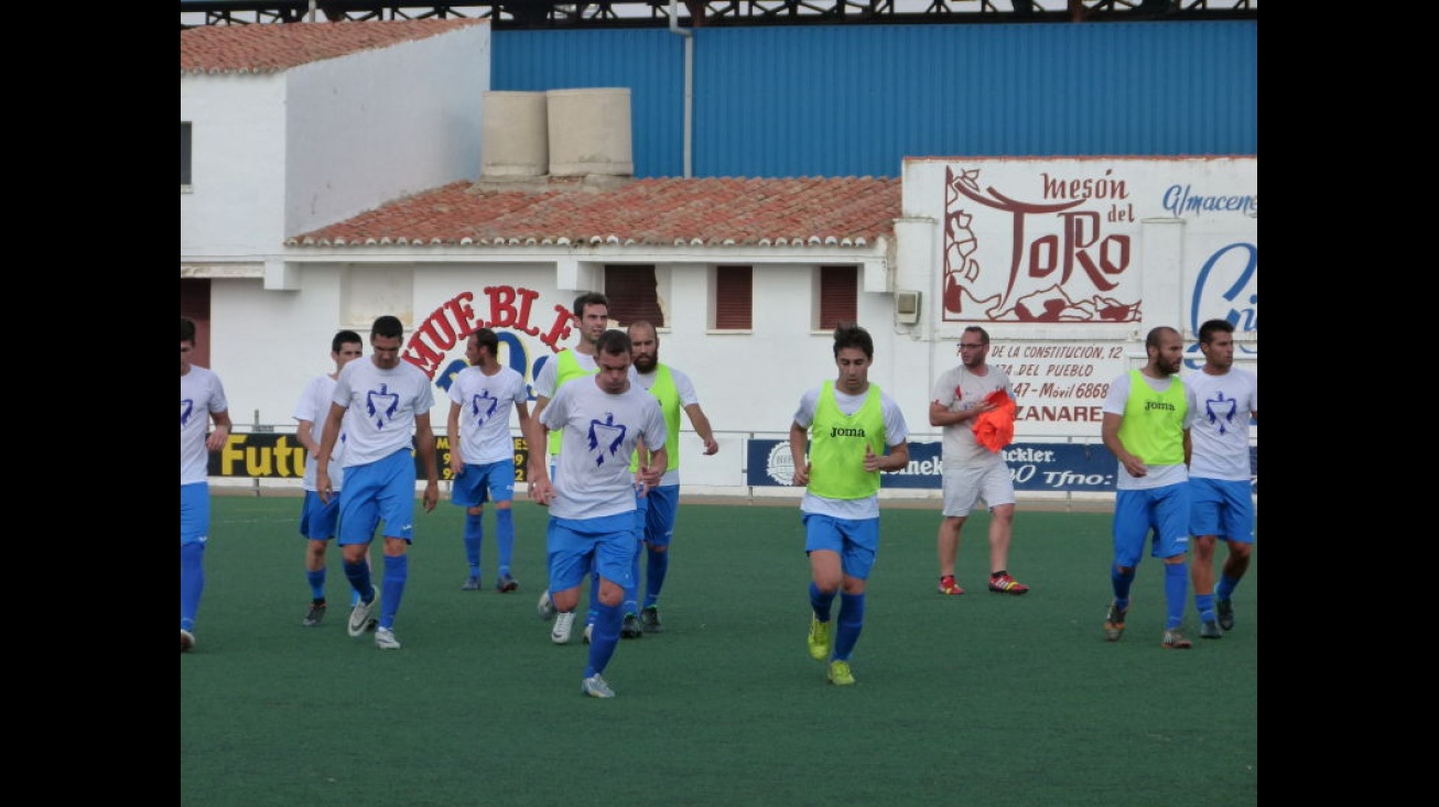 Calentamiento del Manzanares CF antes de su partido con el Madridejos